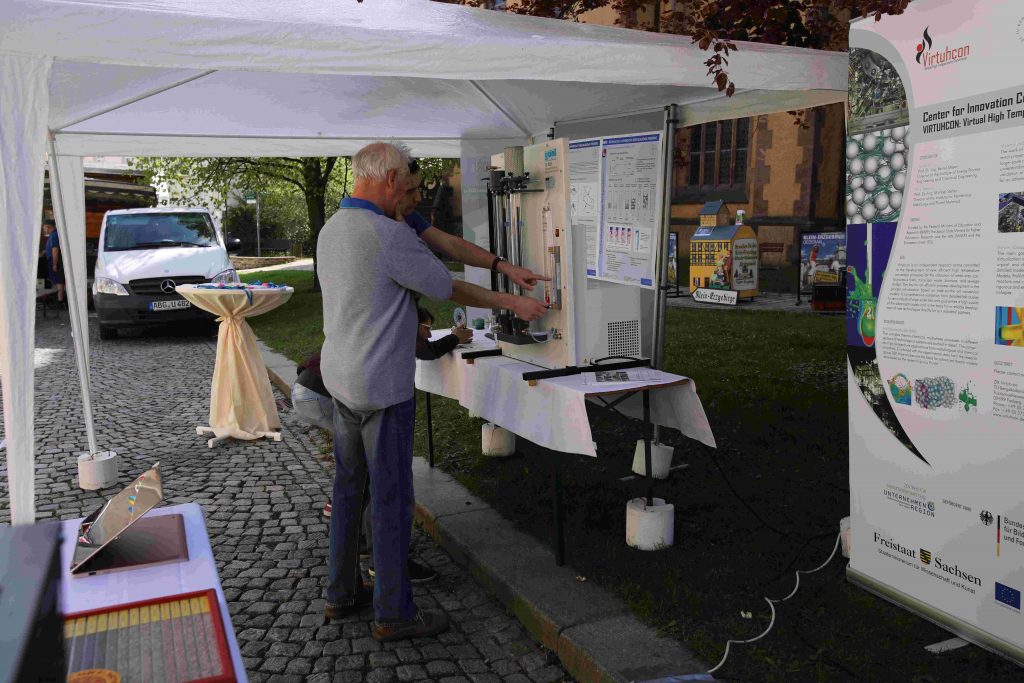 Information stall with visitors